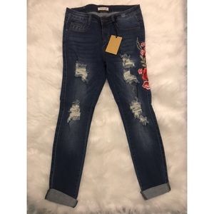 Distressed rose jeans